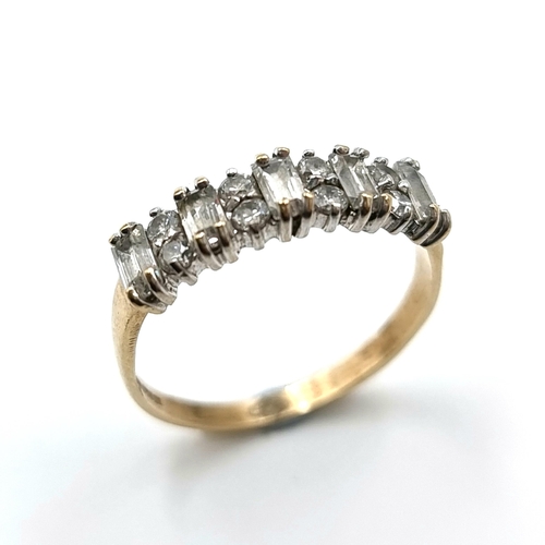 15 - A nine carat gold gem set half eternity ring. Ring size - N. Weight - 1.77 grams.