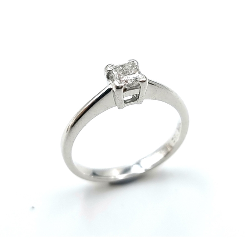 16 - Star lot : An 18 carat white gold diamond solitaire ring. Est. weight of diamond - 0.3 carats. Size ... 