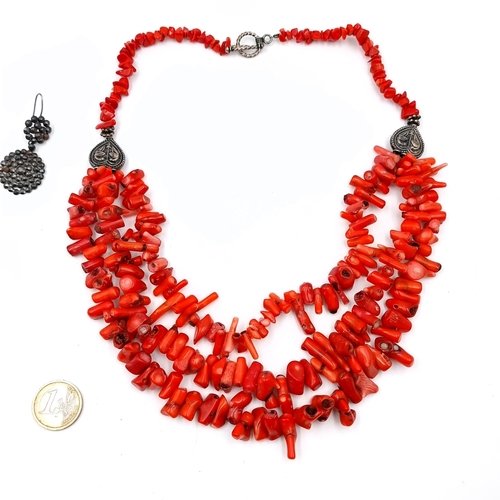 21 - A very nice example of a vintage double row coral necklace. Length - 52 cms. Weight - 183 grams.