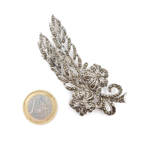 23 - A most attractive large 925 sterling marcasite floral design brooch. Dimensions - 8 x 4 cms. Weight ... 