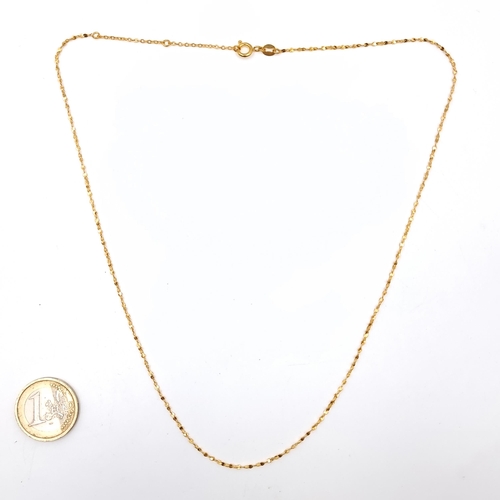 31 - A gold necklace marked AU750 (18 carat gold). Length - 48 cms. Weight - 1.64 grams.