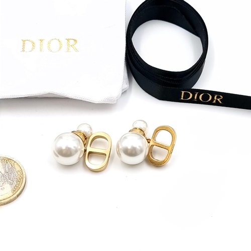 35 - A pair of attractive Christian Dior pearl drop stud earrings. Weight - 9.6 grams. Comes in original ... 