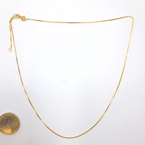 36 - A gold necklace marked AU750 (18 carat gold). Length - 44 cms. Weight - 1.79 grams.