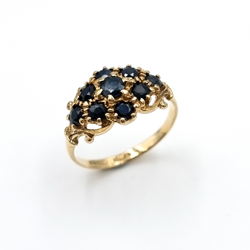 4 - A nine carat gold antique sapphire cluster ring. Weight - 1.9 grams. Size - L.