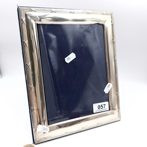 57 - A handsome sterling silver glazed photo frame set with velvet mount and back. Hallmarked Carrs of Sh... 