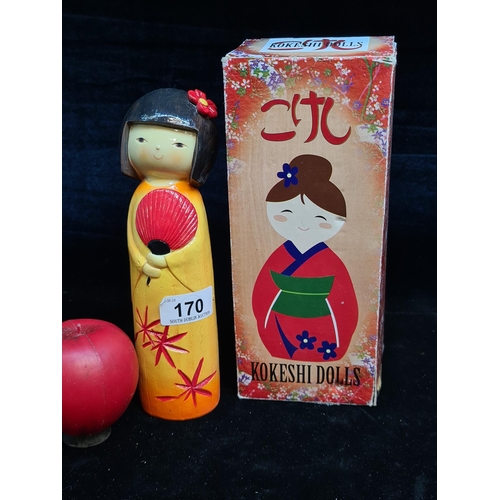 170 - A Japanese hand painted Kokeshi doll. In original box. These dolls have been hand crafted and hand p... 