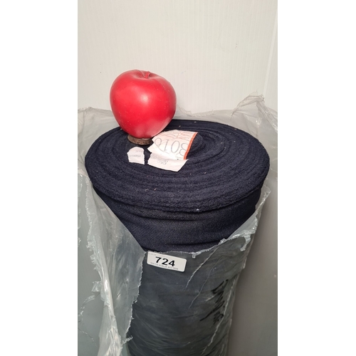 724 - A large roll of navy fabric for furniture reupholstery.