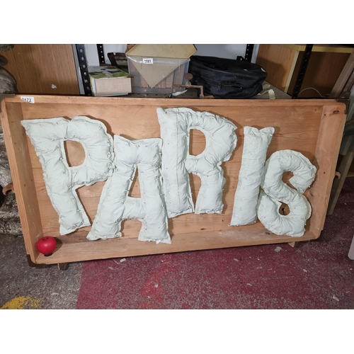 1172 - A charming rustic Paris light up upholstered wall sign in wood casing