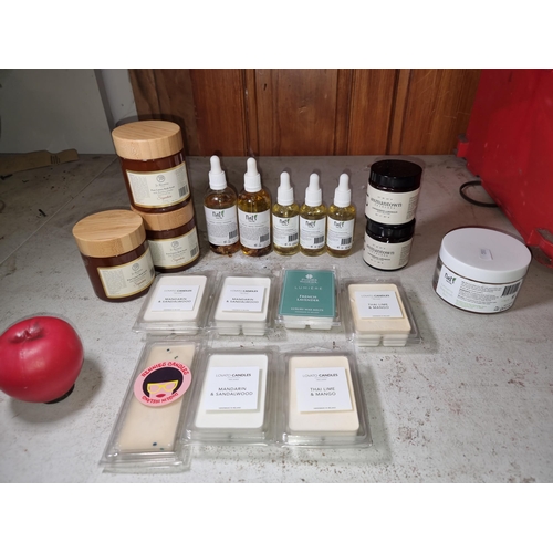 1177 - A box containing natural products such as wax melts, face oils, body scrubs and body butter.