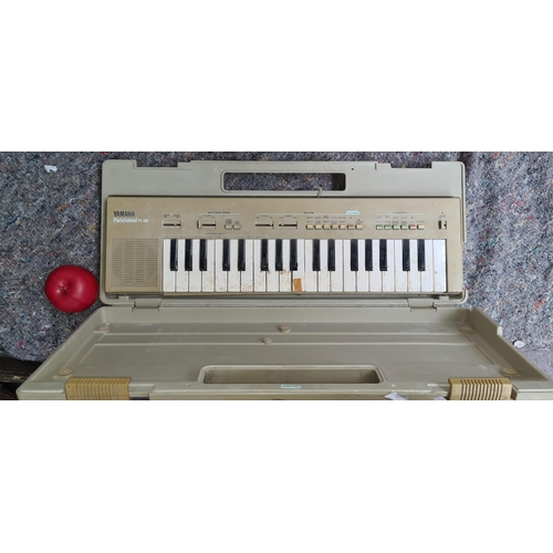 1194 - A vintage Yamaha PortaSound PS-300 keyboard. 300 Analog Synth 1980s Tan With original travel case. R... 