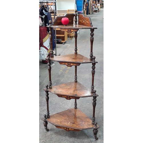 1211 - An antique, Victorian corner four tier what not featuring beautiful wood inlay detailing throughout,... 