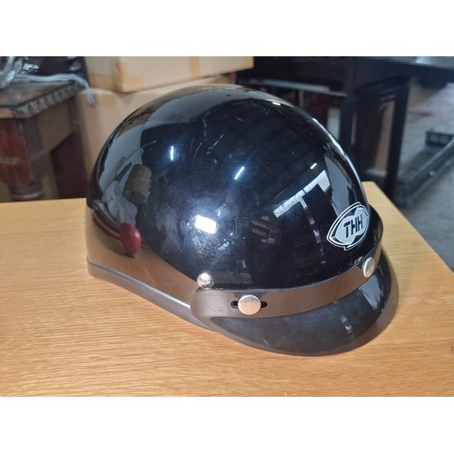 1224 - A brand new THH cruiser helmet in a gloss black finish, cant see a size on it.