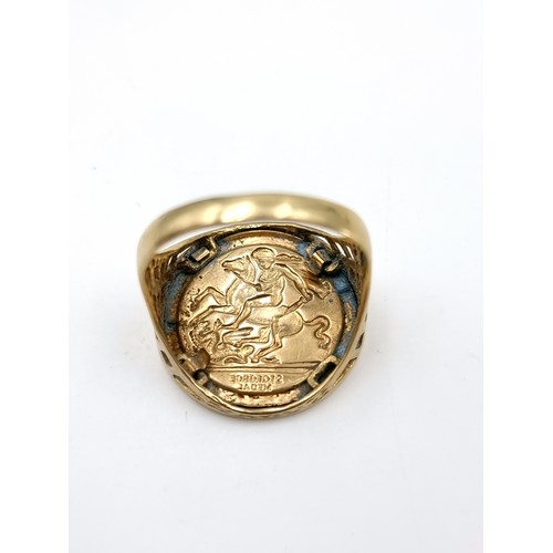 1208 - Star Lot: A vintage gents nine carat Gold St George sovereign style Basket Ring. Ring size T. Total ... 