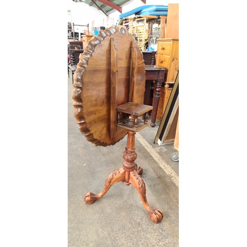 719 - Star Lot : A beautiful Victorian Oak flip top tripod table with scalloped-edge round top and finely ... 