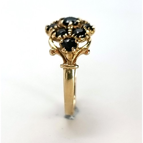 4 - A nine carat gold antique sapphire cluster ring. Weight - 1.9 grams. Size - L.