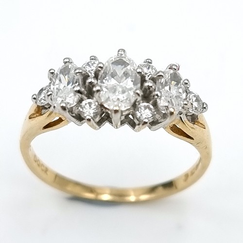 14 - A 14 carat gold gem set cluster ring. Ring size - P. Weight - 2.93 grams.