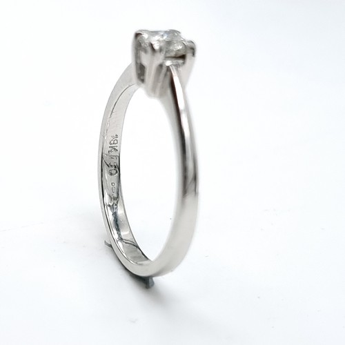 16 - Star lot : An 18 carat white gold diamond solitaire ring. Est. weight of diamond - 0.3 carats. Size ... 