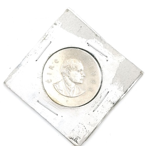 52 - A carded Padraig Pearse 1966 commemorative coin. Silver content - 83%. Weight - 18.48 grams.