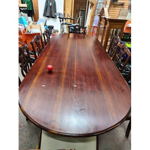 1230 - Star Lot : A fabulous very large Chippendale style 8 piece dining table and 8 matching chairs. The t... 