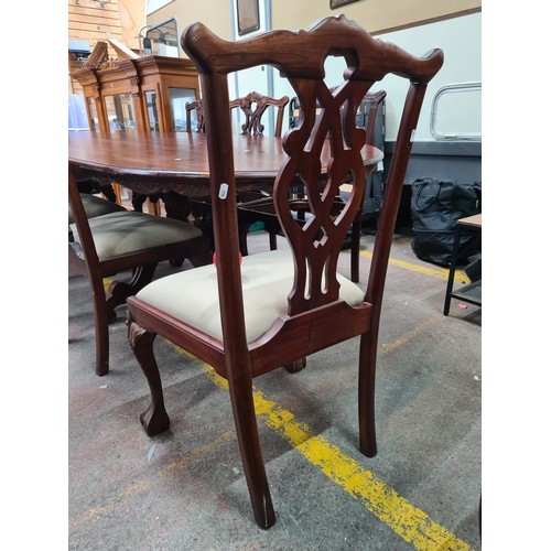 1230 - Star Lot : A fabulous very large Chippendale style 8 piece dining table and 8 matching chairs. The t... 