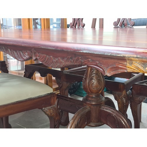 1230 - Star Lot : A fabulous very large Chippendale style 8 piece dining table and 8 matching chairs. The t... 