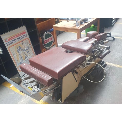 1228 - An interesting lot a pair of 1970s Zenith electrical chiropractic beds, With heavy metal bases and m... 