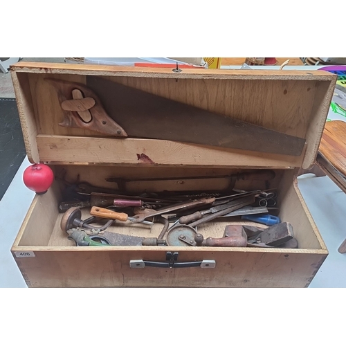 406 - A Vintage wooden carpenters toolbox containing assorted carpenter tools, including saws, hand drills... 