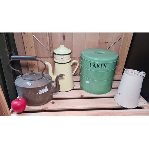 411 - Collection of vintage kitchenware includes a copper kettle, yellow enamel coffee pot, green TALA cak... 