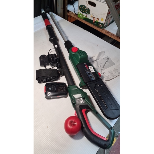 418 - Bosch Universal Polesaw 18 battery chainsaw. Includes 2.5 Ah battery, charger, adjustable pole exten... 