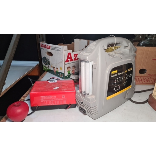 425 - Gunson 6 & 12 Volt Battery Charger and Halfords Portable Powerpack 100, including cables.