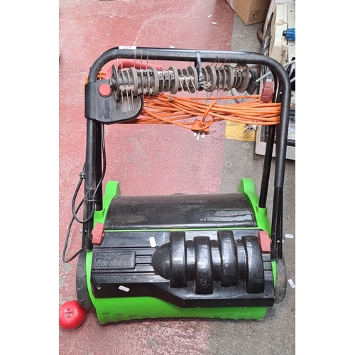 433 - A Florabest FLV 1200 B1 Electric Scarifier/Lawn Aerator, which features a 31cm cutting width.