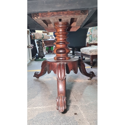 435 - Star lot : A gorgeous Irish Georgian Rosewood pedestal table with a round top and intricately carved... 