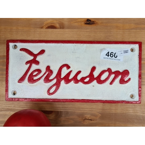 460 - A heavy Cast metal advertisement for Massy Ferguson, painted in red and white. Reverse side marked w... 