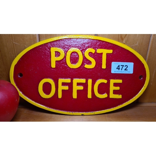 472 - A heavy cast iron POST OFFICE sign. Vibrant red and yellow. Oval-shaped with pre-drilled holes for m... 