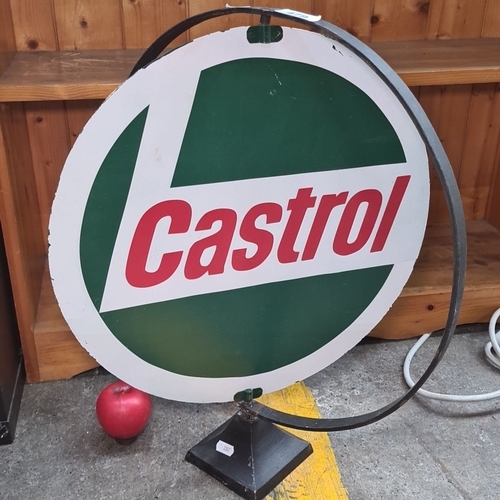 479 - A Castrol advertising double sided swivel sign with circular metal frame and stand. Featuring classi... 