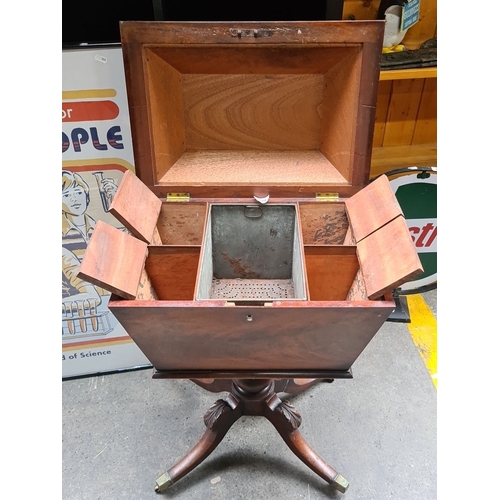 480 - Star lot : A gorgeous 19th-century Regency mahogany cellarette with pedestal base, brass castor whee... 