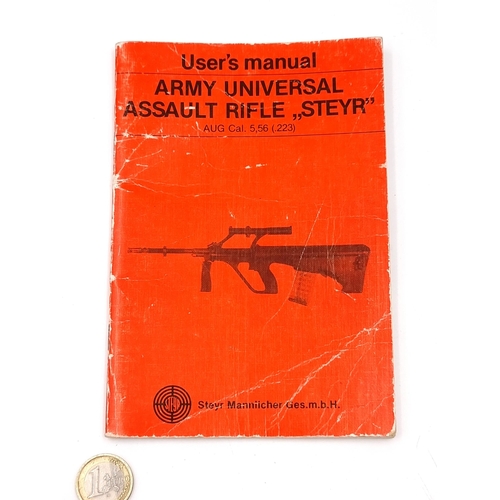 12 - A rare user's manual for the 'Army Universal Assault Riffle (Steyr)'. Manual in complete, clean cond... 