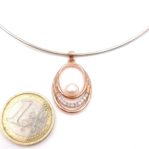 15 - A stylish silver necklace with rose gold gem stone cluster pendant. Stamped S925.