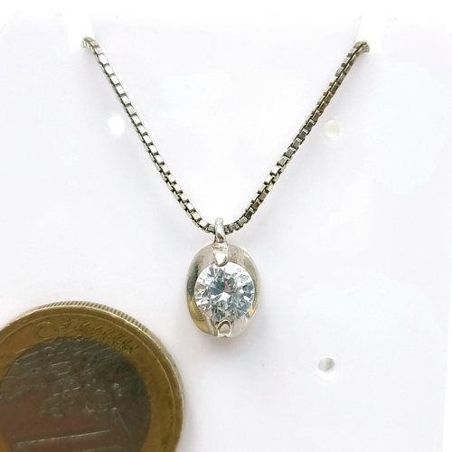 42 - A sterling silver gem set pendant necklace with sterling silver chain. Length - 42 cms. Boxed.