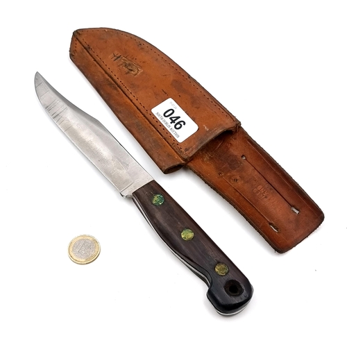 46 - A Bowie knife made by Nowill Sheffield eng. Set with wooden handle and leather sheath. Dimensions: B... 