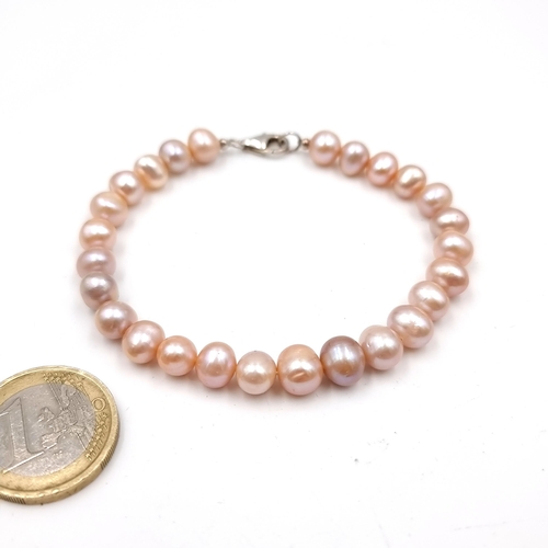 50 - A Super pretty luster graduated natural pearl (freshwater) bracelet. Boxed.