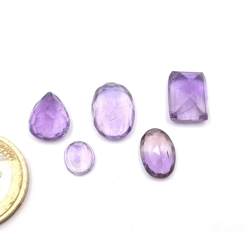 58 - A collection of five  stunning facet cut amethyst gemstones. Total weight - 23 carats. All good clea... 