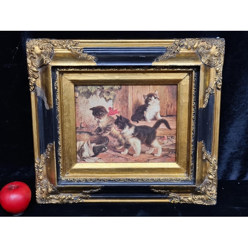 77 - A very sweet oleograph of a Jules Leroy oil painting titled 'Kittens at Play'. Features three mischi... 