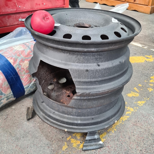 357 - A super cool tire / wheel rim upcycled into a footed fire pit.