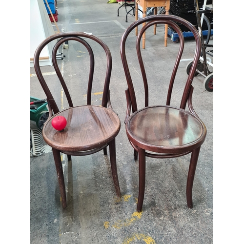 367 - A pair of charming vintage bent wood bistro chairs.