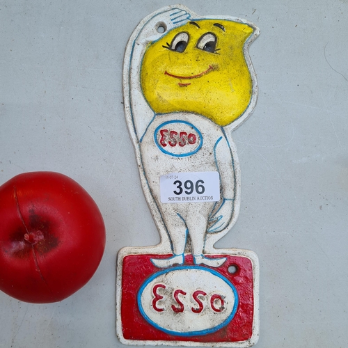 396 - A cast metal wall plaque advertising ESSO.