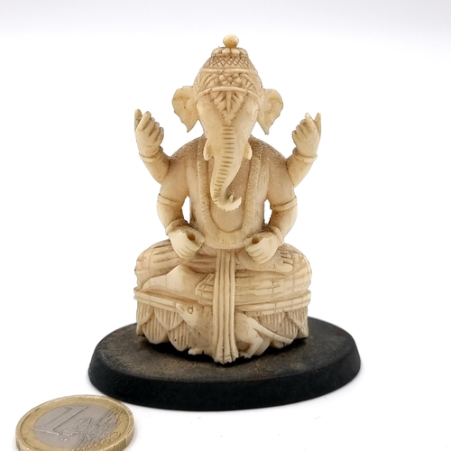 508 - An interesting and unusual antique bone carved Lord Ganesha figure set with further intricate carvin... 