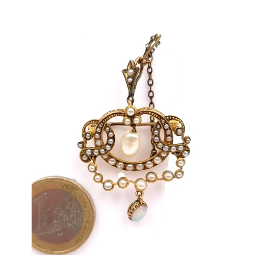 533 - A most attractive antique pearl set brooch with a super fire opal drop pendant. Together with pin sa... 