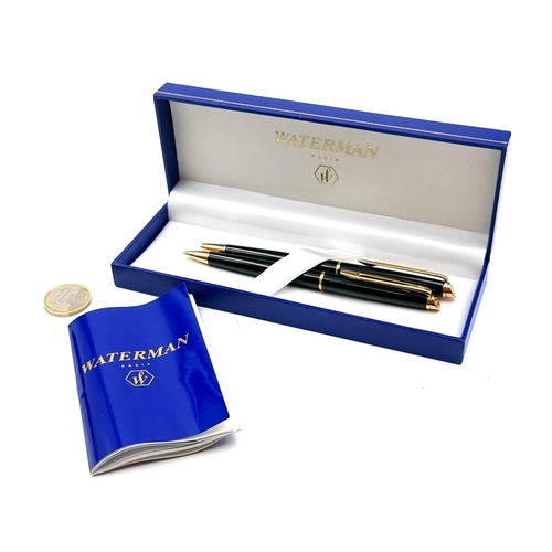 534 - A boxed set of Waterman ballpoint & propelling pencil set. Pens with black barrels and gold metal ac... 