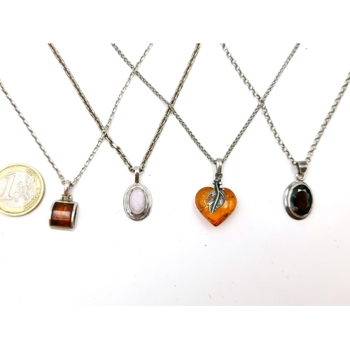 546 - A collection of four gem set necklaces, Including Sterling Silver.  (one amber). Length of chains - ... 